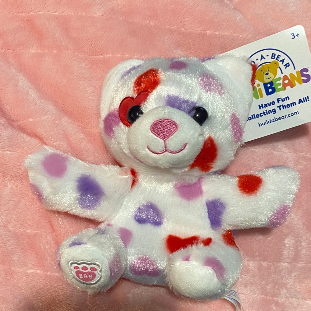 BUY ONE GET ONE FREE

Build-A-Bear White Plush with Red and Purple Spots
